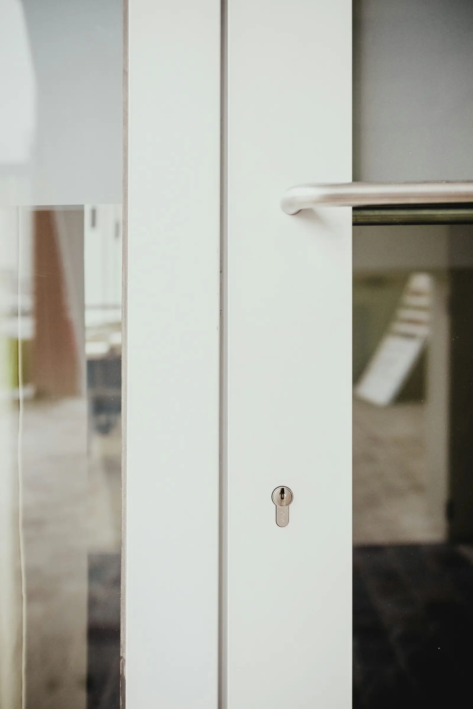 Close-up of a sliding door handle and latch