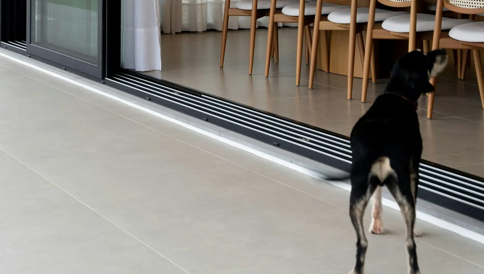 Close-up of a sliding door bottom track